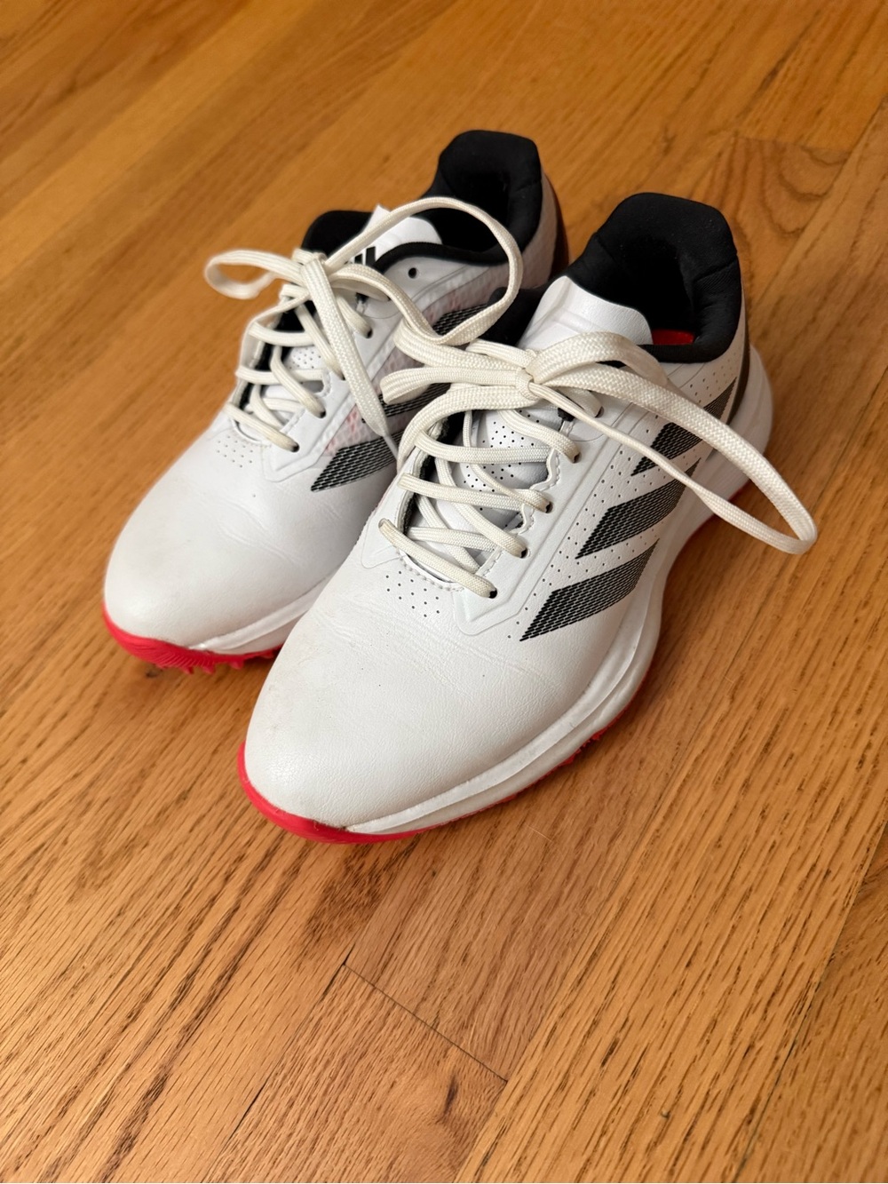 Kid’s Adidas Golf Shoes White with Black Accents and Red Soles